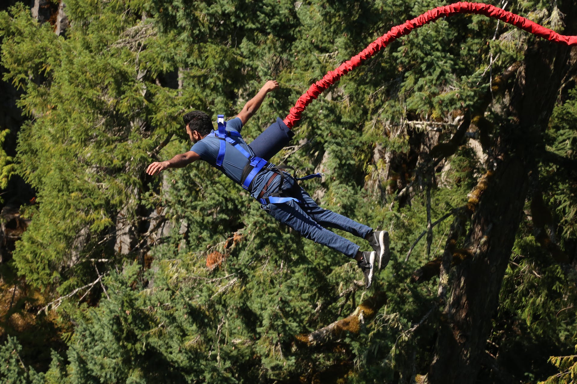 Daring Leap into the Abyss: A Man's Bungee Jumping Adventure